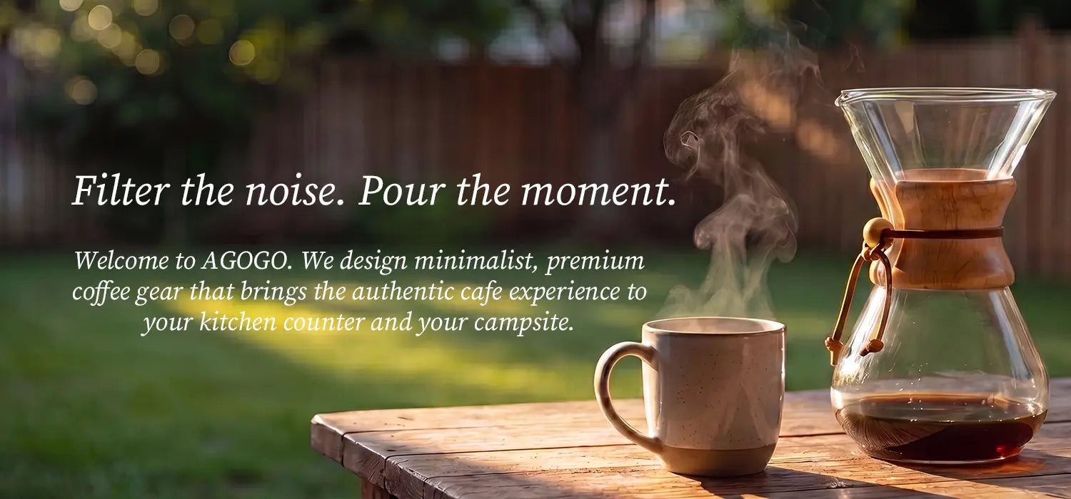 AGOGO brand hero banner displaying a glass pour-over coffee maker on an outdoor wooden table, featuring the core slogan "Filter the noise. Pour the moment." and highlighting minimalist coffee gear.