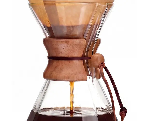 Close-up of the AGOGO Diamond geometric coffee carafe brewing a clean, bright cup of coffee with a premium high-density paper filter.
